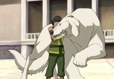 an animated image of two men and a woman standing in front of a giant animal