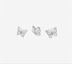 three butterflies flying in the sky with one being drawn to look like it is floating