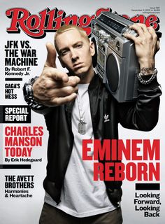 a man on the cover of rolling stone magazine holding a boombox in his right hand