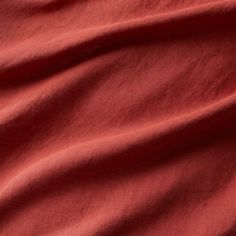 an image of a red cloth that is very soft and smooth to look like it has been