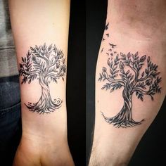 two people with tattoos on their legs, one has a tree and the other has birds