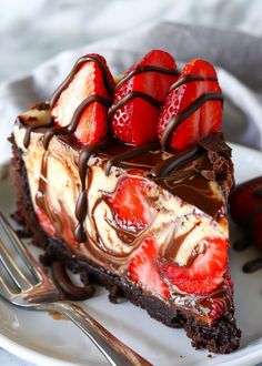 a slice of chocolate cheesecake with strawberries on top