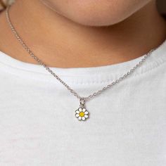 An adorable floral charm that will instantly add a big smile to a young girls face. This sweet daisy flower charm is designed with a vibrant white and yellow enamel detailing to show off the petals of the daisy. Such a cute and small charm that radiates positivity and happiness. Crafted entirely from a hypoallergenic 925 sterling silver, this charm is the perfect piece to get her collection started without irritating her sensitive skin. A gift box is included with your purchase for easy gifting. Silver Everyday Charm Necklaces With Flower Charm, White Sterling Silver Charm Necklaces With Flower Charm, Cute Flower-shaped Jewelry With Flower Charm, Sterling Silver Daisy Jewelry With Flower Charm, Cute Daisy-shaped Jewelry With Flower Charm, Small Charms, Enamel Flower, Girl Face, Flower Charm