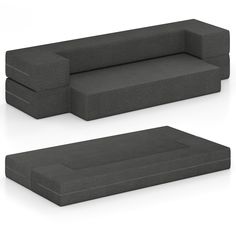 two black couches sitting next to each other on a white surface and one is facing the same direction