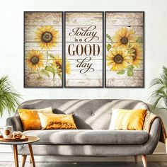 three sunflowers with the words today is a good day hanging on a wall