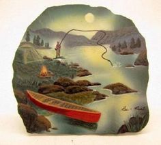 a ceramic plaque depicting a man fishing on the lake with a boat and campfire