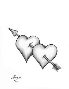 two hearts with an arrow in the middle are drawn by hand on a white paper