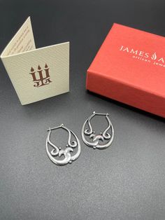 James Avery Rare Scrolled Earrings Sterling Silver 925 Retired and HTF  Comes with James Avery box Before purchasing, please make sure your shipping address is correct in your Etsy account. I will not change the shipping address after purchase due to so much buyer fraud going around. If you purchase and need an address change, we will have to cancel the transaction and start over.  Return Policy- Buyer must contact me within 5 days of delivery to notify me of return and ship with tracking insured within 7 days of receiving the item. No returns after the allotted days. Buyer pays return shipping and must return item with tracking number. Once item is returned back to me in its original condition, a refund will be issued. No returns allowed on customized pieces or rings that sized per custom Engraved Sterling Silver Hoop Earrings, Luxury Sterling Silver Hoop Earrings As Gift, Engraved Sterling Silver Hoop Earrings For Anniversary, Sterling Silver Engraved Hoop Earrings For Anniversary, Hallmarked Sterling Silver Hoop Earrings, Classic Engraved Sterling Silver Earrings, Luxury Teardrop Hoop Earrings In Sterling Silver, Hallmarked Oval Sterling Silver Hoop Earrings, Hallmarked Teardrop Hoop Earrings As Gift