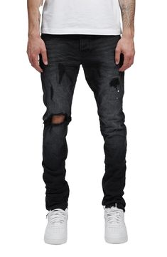 Inky denim with a touch of stretch means city-ready comfort in these mid-rise jeans enhanced with hand-applied repairs. 31" inseam; 9" leg opening; 11" front rise; 14" back rise (size 29) 98% cotton, 2% Lycra® spandex Machine wash, line dry Imported Asian Owned/Founded Urban Style Distressed Fitted Jeans, Urban Distressed Fitted Jeans, Urban Ripped Fitted Jeans, Urban Style Ripped Fitted Jeans, Washed Black Ripped Jeans Relaxed Fit, Washed Black Ripped Jeans In Relaxed Fit, Washed Black Relaxed Fit Ripped Jeans, Urban Stretch Washed Jeans, Fitted Ripped Washed Black Jeans