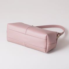 "This kiss lock handbag is individually handcrafted with semi-structured leather (not rigid) and is available in SIX color choices - dusty pink, black, burgundy, navy, dark brown or red and TWO hardware finishes (silver or antique brass). You also have several shoulder strap choices - a .75 inch wide standard strap, a 1.5 inch wide strap, a .75 inch wide crossbody strap, a .75 inch wide \"shorty\" strap, or a .75 inch wide \"shorty\" strap with a .75 inch wide crossbody strap. This kiss lock fra Elegant Pink Rectangular Baguette Bag, Pink Leather Baguette Bag For Daily Use, Modern Pink Leather Baguette Bag, Elegant Pink Top Handle Baguette Bag, Modern Pink Rectangular Bucket Bag, Pink Leather Rectangular Bucket Bag, Pink Leather Top Handle Baguette Bag, Pink Rectangular Leather Bucket Bag, Pink Box Bag With Top Carry Handle For Office