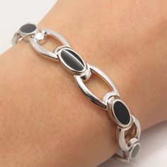 Great vintage condition.  925 Sterling Silver Vintage Real Black Onyx Gem Fancy Link Bracelet 7.25"  Weight: 22.2g   WELCOME TO PAWN SHOP We are an actual pawn shop and have been in business for over 25 years. Since 1990, our establishment has been serving a variety of clients by providing them with short term cash solutions and options of liquidity regarding their treasured heirlooms. Acknowledging that today′s customers are very sophisticated and are looking for a variety of investments, our a Classy Jewelry, Pawn Shop, Last Minute Gifts, 25 Years, Black Onyx, Link Bracelets, Onyx, Vintage Jewelry, Jewelry Bracelets