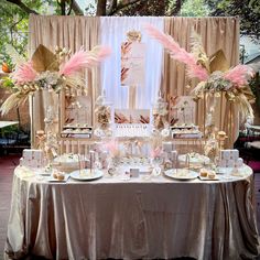 a table topped with lots of cake and desserts