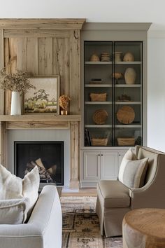 a living room filled with furniture and a fire place in front of a book shelf