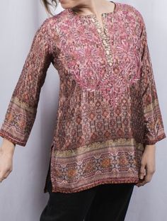 Traditional Silk Tunic For Spring, Embroidered Silk Tunic With Long Sleeves, Embroidered Silk Long Sleeve Tunic, Silk Embroidered Long Sleeve Tunic, Silk Top With Chikankari Embroidery For Spring, Long Sleeve Silk Embroidered Tunic, Festive Silk Tunic Blouse, Embroidered Silk Tunic Kurta, Traditional Long Sleeve Tunic For Fall