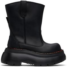 Mid-calf buffed leather slip-on boots in black. · Pull-loops at collar · Logo-embroidered pull-loop at heel tab · Orange topstitching at welt · Padded mesh lining · Foam rubber platform midsole · Treaded rubber sole · Platform: H2 · Heel: H2.5 Supplier color: Metallic black Orange Boots, Workwear Boots, Metallic Boots, Black Tuxedo, Slip On Boots, Chunky Boots, Cool Boots, Mid Calf Boots, Leather Slip Ons