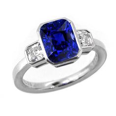 METAL SPECIFICATIONS White Gold 14K STONE SPECIFICATIONS Stone Name : Blue Sapphire and Diamond Stone Cut : Cushion Stone Details : There is one cushion cut sapphire approx. 3 carats (Approx. Size 9 x 7 mm) and two cushion diamonds approx. 0.25 carats each (Approx. Size 3.3 x 3.3 mm) on the sides. Natural earth mined stones. Color : F Clarity : VS1 Quality of Sapphire : AAA Sapphire Treatment : Heated Total : Approx. 3.50 Carats RING SPECIFICATIONS Size : 6.5 (Can ship in any size, please send u Laos Jewelry, Blue Sapphire Diamond Ring, Blue Sapphire Diamond, Cushion Diamond, Sapphire Diamond Ring, 3 Carat, Natural Earth, Stone Cuts, Sapphire Diamond