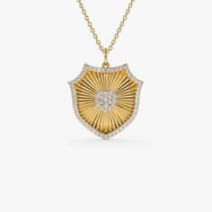 Diamond Charm  / 14k Gold Diamond Shield Medallion Pendant / Sunburst Armor Badge Pendant Necklace  ▶ Details   * Made to Order * Gold KT: 14K Solid Gold (also available in 18K & Platinum upon request) * Length: 18.75 MM * Width: 19.00 MM * Round Diamonds: 63 Pcs 1.00MM * Round Diamonds: 4 Pcs 1.20MM * Total Ctw: 0.35 Ctw * Color and Clarity: G Color SI Clarity * Ready to Ship in 1-2 Business Days ▶ See more of our Diamond Necklace - http://etsy.me/2mqa6O1  ▶ See our storefront here - http://etsy.me/2lUcVnH  ▶ All store sections here * Diamond Rings - http://etsy.me/2lwKUl8  * Diamond Earrings - http://etsy.me/2lyqVBP  * Diamond Necklace - http://etsy.me/2mqa6O1  * Diamond Bracelets - http://etsy.me/2mVrAB5  * Diamond Wedding Rings - https://etsy.me/3YbpVq2  * Gold Wedding Band - https://e Luxury Yellow Gold Medallion Diamond Necklace, Luxury 14k Gold Medallion Diamond Necklace, Rose Gold Charms, Gold Armband, Medallion Necklace, Ruby Jewelry, Diamond Charm, Emerald Jewelry, Sapphire Jewelry