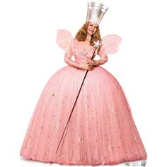 a woman in a pink dress with a crown on her head and holding a wand