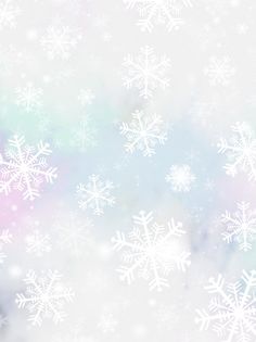 snow flakes on a white background with blue and pink highlights in the foreground