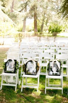 an outdoor ceremony with white chairs and pictures on them