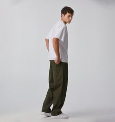 A stylish yet functional wardrobe staple, the Edgar Pant. This design offers a baggy fit and is constructed from 100% Cotton for a high quality and durable canvas pant that will last. Style with our Box Tees and Otis Jacket for that classic skatewear look. Model: 185cm (6ft) // 75kg (165lbs) // 31" Waist // Wears: Medium Fits and Features - Baggy fit- Wide leg- Back patch pockets- Side angled front pockets- Gunmetal rivets on front and back pockets- YKK metal zipper fly front- 100% Cotton Functional Wardrobe, Canvas Pants, Hooded Tee, Skate Wear, Skirt Co Ord, Crew Shirt, Metal Zipper, Short Jacket, Tee Dress