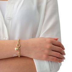 "\"14k Gold Rolo Link Bracelet with Heart Charm | Thick Belcher Chain Gold Bracelet, Sailor Lock Clasp, Puffy Heart Charm | Gift for Her\" ◖ P R O P E R T I E S ◗ * Material: 14k Gold * Weight #1: 2,8gram (for 7\", with charm, ±5%) * Weight #2: 5,9gram (for 7\", with charm, ±5%) Contact me if you are unsure about length. Photos belong to the #2 Large Rolo Bracelet except last 2 photos ◖ D I O N J E W E L ◗ ‣ 14K REAL GOLD ‣ EXPRESS DELIVERY IN 1-3 DAYS* ‣ HANDMADE ONLY FOR YOU, NO USED JEWELRY ‣ Tarnish Resistant Charm Bracelet For Anniversary, Valentine's Day Gold Bracelet With Adjustable Chain, Tarnish Resistant Charm Bracelet For Valentine's Day, Bracelets With Spring Ring Clasp As Gift, Gift Bracelets With Spring Ring Clasp, Rolo Chain Bracelet As A Gift, Everyday Heart Bracelet With Lobster Clasp, Rolo Chain Bracelet Gift, Dainty Heart Bracelet With Charms