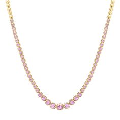 An updated take on a timeless piece, our Graduated Pink Sapphire Tennis Necklace is handcrafted in 18-karat yellow gold and set with 3.0 carats of round, brilliant cut pink sapphires in varying size - with the largest pink sapphires set in the center and gradually get smaller until they meet the plain, polished gold bezels that comprise the rest of the necklace. Carat Weight: 3.0 ct Necklace measures 16 inches in length Push Clasp Fastening with Safety Made with love in Los Angeles Complimentary Elegant Yellow Gold Necklaces With Pink Sapphire, Luxury Pink Diamond Necklace, Yellow Gold Pink Sapphire Necklace, Gold Jewelry With Pink Sapphire, Pink Diamond Necklace For Formal Occasions, Gold Jewelry With Round Cut Pink Sapphire, Luxury Pink Necklace With Brilliant Cut, Pink Sapphire Round Jewelry, Formal Pink Necklace With Brilliant Cut