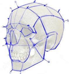 a drawing of a skull with spikes on it's head is shown in blue ink