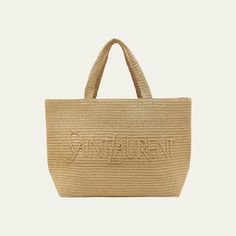 Saint Laurent raffia and viscose tote bag with logo across front  Flat shoulder straps, 8.2" drop  Open top  Interior, one slip pocket  Bronze hardware  Approx. 13.7"H x 16.9"W x 7"D Imported Designer Rectangular Crochet Bag For Daily Use, Designer Rectangular Crochet Shopping Bag, Designer Straw Bag With Top Carry Handle For Travel, Luxury Bag With Rolled Handles In Natural Color, Designer Straw Travel Bag With Top Carry Handle, Designer Straw Bag For Travel With Top Carry Handle, Designer Straw Bag With Double Handle For Daily Use, Designer Travel Straw Shoulder Bag, Designer Summer Straw Shoulder Bag