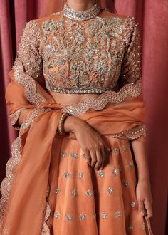 Buy Peach Lehenga Choli and Dupatta Dress for Bride adorned with sequins, naqshi, and cut-dana work. The Lehenga Choli is available Online. Custom sizes Different Lehenga Styles, Zardosi Embroidery Lehenga, Desi Embroidery, Indian Engagement Outfits, Choli Embroidery Designs, Peach Lengha, Peach Bridal Lehenga, Lehenga Embroidery Design, Hussain Rehar