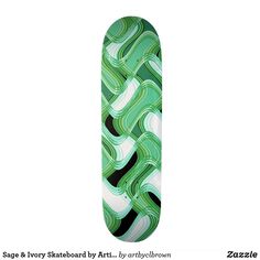 a skateboard with green and white designs on it