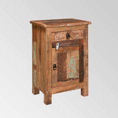 an old wooden cabinet with metal handles