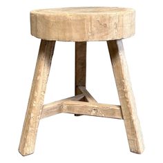 a wooden stool made out of logs on a white background