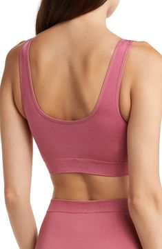 Smooth and stretchy fabric shapes a soft bralette designed with seamless construction for all-day comfort and a wide underbust band that provides light support for smaller figures. Knitting between the cups creates natural shaping and definition. Removable soft cups Partially lined Nylon/spandex Hand wash, line dry Imported Women's Clothing Seamless Medium Support No-show Bra, Workout Stretch Bra With Soft Touch, Workout Bra With Soft Touch And Stretch, Seamless Cropped Bra For Loungewear, Cropped Seamless Bra For Loungewear, Soft Touch Stretch Bra For Yoga, Seamless Medium Support Scoop Neck Bra, Seamless Scoop Neck Bra With Medium Support, Stretch Bra With Soft Touch For Yoga