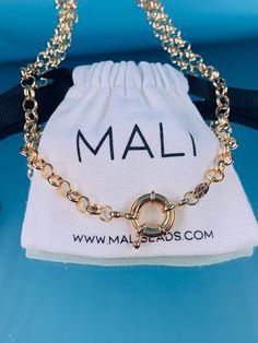 18 Karat Gold Filled Large Chain 7mm Rolo Chain with Bolt Clasp Chain Options available below. Material: 18 Karat Gold Filled, Hypoallergenic. Tarnish Resistant. Gold-filled does not de-laminate or peel like Gold plated Jewelry nor does it tarnish as readily as silver. Generally speaking, gold filled is better quality and will have a much longer lasting color than plated jewelry. We recommend keeping abrasive chemicals away from the jewelry for the items to last. Thank you for visiting and suppo Gold Chain Necklace Gift, Metal Jewelry With Rolo Chain In Round Shape, Metal Jewelry With Rolo Chain, Gift Jewelry With Rolo Chain, Metal Rolo Chain Jewelry, Gold Rolo Chain Jewelry Gift, Gold-tone Chain Link Jewelry With Spring Ring Clasp, Gold-tone Chain Necklace With Lobster Clasp, Adjustable Jewelry With Rolo Chain