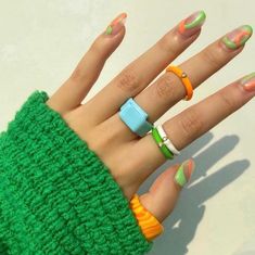 So bright, so light! The perfect neon stacking rings to go with our other BONBONWHIMS staple rings. Thick coated enamel over gold-plated brass. Adjustable & comes in one size that fits anywhere from size US 5-9. Measurements: - 17 mm diameter unadjusted- 3 mm thick Trendy Enamel Ring For Everyday, Trendy White Enamel Rings, Trendy Neon Jewelry, Trendy White Rings For Summer, Trendy Enamel Rings, Trendy Adjustable Enamel Rings, Trendy Neon Jewelry For Summer, Trendy Green Rings For Everyday Wear, Trendy Orange Plastic Jewelry