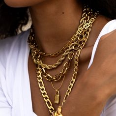 A trendy chunky link chain to elevate your stack. Chunky Link Necklace Length: 17" plus a 2" extension chain attached Width: 11mm Material: Stainless Steel Plating: 18k real gold Necklace is 100% nickel-free and cadmium-free Necklace is hypoallergenic and tarnish resistant Trendy Jewelry With Chunky Chain And Rectangular Links, Everyday Figaro Chain Charm Necklace, Trendy Chunky Chain Necklace With Rectangular Links, Trendy Charm Necklaces With Adjustable Chain Link, Everyday Charm Necklace With Figaro Chain, Trendy Gold Chain Link Charm Necklace, Chunky Jewelry With Rectangular Links For Gift, Trendy Chunky Chain Necklace For Everyday, Everyday Chunky Chain Link Necklace