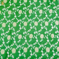 a green and white floral print fabric