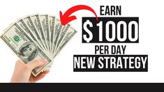 a hand holding money with the words earn $ 1, 000 per day new strategy