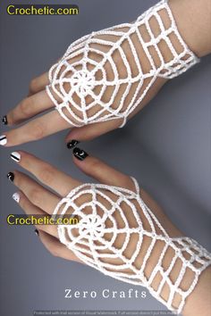 two hands with white crocheted lace on them and black nail polish in the middle