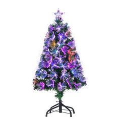 a purple christmas tree with lights on it's top and bottom branches, in front of a white background