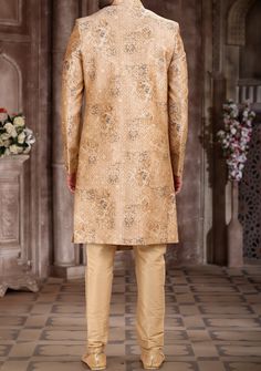 Ready-Made Sherwani With Trouser. All Over Jacquard Brocade Style Printed Fabric Top. Art Dupion Aligarhi Ready Made Trouser. Crafted in Chinese Collar Neck, and Full Sleeve. Satin Lining with Plain Work. High-Quality Matching Buttons. Please Note: The footwear shown in the picture is for presentation and photography purpose only. Color: There might be slight color variation due to lightings and flashes while photo shooting. The color may also vary because of different screen resolutions. Wash C Ceremonial Fitted Nehru Jacket With Self Design, Fitted Full Length Traditional Wear, Fitted Full-length Traditional Wear, Brocade Unstitched Suit With Straight Kurta For Wedding, Brocade Unstitched Suit For Wedding, Straight Kurta Style, Festive Straight Kurta Sherwani With Zari Work, Self Design Nehru Jacket For Wedding And Transitional Seasons, Transitional Brocade Salwar Kameez With Dabka Detailing, Formal Jamawar Salwar Kameez With Self Design