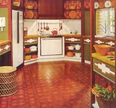 an old fashioned kitchen with red tile flooring