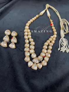 Silver Mossanite Polki Set Jewelry |Indian Wedding Jewelry Set | Polki Set | Indian Traditional Jewelry | Wedding jewelry | Pendant set Material : Silver Gemstone: Mossanite Polki Primary colour: Gold Earring Closure: Screw back and clips Size- Earring : width: 30mm Length: 50mm Nacklace: 285mm Pendant: Width: 30mm Length: 30mm Silver Intricate, hand crafted, Pure Silver Polki Necklace and Earring Set, studded with high quality Mossanite Polki and Earring comes with screw back and clips , made i White Crystal Jewelry With Stone Work, White Kundan Jewelry For Anniversary, White Stone Work Necklace For Anniversary, White Kundan Necklace With Rose Cut Diamonds For Gift, White Kundan Necklace With Rose Cut Diamonds, Gold Kundan Necklace With Rose Cut Diamonds For Wedding, White Stone Work Jewelry For Anniversary, Dazzling Kundan Wedding Necklace, Gold Jewelry Sets With Rose Cut Diamonds For Wedding