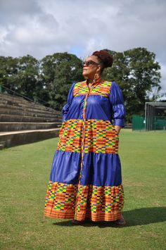 This Ankara Patterned long dress/Long African print button up dress Is beautiful and perfect for any occasion. Its long sleeves allow for you to wear it comfortably as well as the long length button up design which allows for the extra comfortability.The bit of plain fabric give its a unique look and is surely to make you stand out at any occasion. Multicolor Long Sleeve Maxi Dress With Buttons, Long Sleeve Printed Dresses For Casual Wear, Multicolor Maxi Dress With Buttons, Multicolor Fall Dress With Button Closure, Multicolor Printed Button-up Dress, Patterned Long Sleeve Printed Maxi Dress, Printed Long Sleeve Maxi Dress For Casual Wear, Multicolor Button-up Maxi Dress, Multicolor Bohemian Button-up Dress