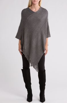 Love to layer this elegant poncho knit from metallic yarns in a V-neck silhouette. V-neck 100% acrylic Dry clean Imported Knit Poncho, Metallic Knit, Metallic Yarn, Kids Uggs, Fall Accessories, How To Make Shoes, Knitted Poncho, Nanette Lepore, Swimwear Cover Ups