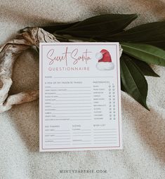 a printable santa's hat questionnaire sitting on top of a table