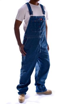 PRICES MAY VARY. Cross-over high-back style Hammer loop and double tool pocket Large bib pocket with pencil division and watch pocket Zipper fly, triple stitched felled seams Fits over boots Overalls Boy, Dickies Clothing, Dickies Overalls, Workwear Brands, Watch Pocket, Denim Dungarees, Safety Clothing, Work Uniforms, Bib Overalls