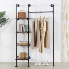 PRICES MAY VARY. INDUSTRIAL AND RETRO STYLE -- Industrial pipe clothes rack has a unique water pipe design for a retro industrial look. SAVING STORAGE SPACE -- Industrial clothing rack with three large solid wood shelves ensure you have enough space for clothes, providing an easy solution to crate extra storage in tight spaces with this industrial clothing rack. EASY TO INSTALL -- Strong industrial iron, strong wall mounted bolt , this clothes rack is sturdy and heavy duty. With clear instructio Clothing Rack With Shelves, Industrial Pipe Clothing Rack, Wall Mounted Closet, Pipe Clothes Rack, Single Clothes, Industrial Clothing, Free Standing Closet, Metal Clothes Rack, Closet Rods