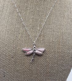 This dragonfly essential oil necklace has polymer clay that I baked into the pendant.  It is a delicate and classic design.  The pendant is made from an alloy metal.  26.7x32.4mm  Apply your favorite oil to the front or the back of the clay and enjoy the scent!!  The chain is 16" in length.  Lobster clasp with a two inch extender.  To see more items visit my website at https://www.ferdysjoy.com Essential Oil Necklaces, Dragonfly Necklace, Aromatherapy, Classic Design, Essential Oils, Favorite Jewelry, Polymer Clay, Jewelry Necklace Pendant, Jewelry Necklaces